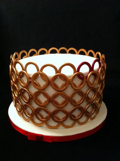 golden wedding anniversary with two red rings - Cake by sasha