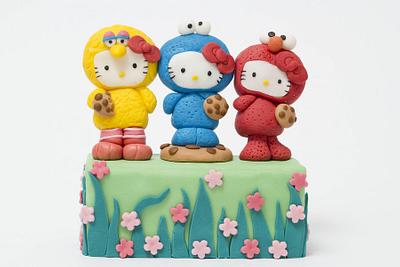 hello kitty muppets with cookies - Cake by bamboladizucchero
