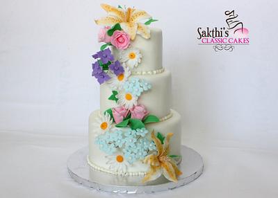 Three tier flower cake - Cake by Classic Cakes by Sakthi