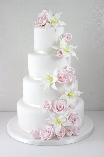 Rose and lily cascade wedding cake - Cake by The Fairy Cakery
