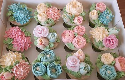 Buttercream flowers, wedding cupcakes.  - Cake by Kate