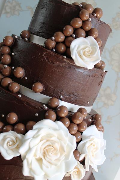 Large chocolate and maltesers wedding cake with sugar roses. - Cake by Zoe's Fancy Cakes