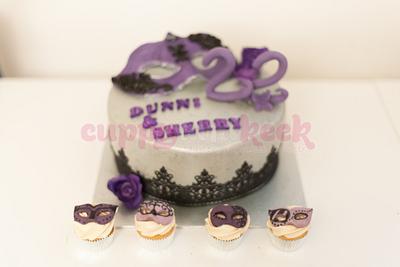 Masquerade birthday cake with mini cupcakes - Cake by Cuppy And Keek
