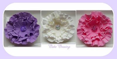 ruffle flowers with diamontes - Cake by Hayley