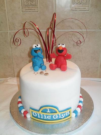 Elmo and the Cookie Monster - Cake by Marie 2 U Cakes  on Facebook