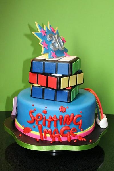 80's themed tiered cake. - Cake by Delights by Design