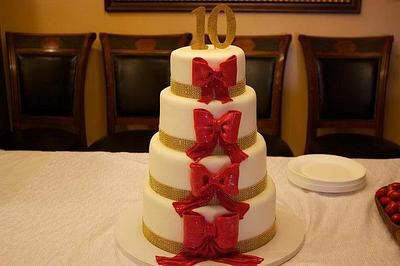 Anniversary Cake adourned with Large Red Bows - Cake by Jewell Coleman