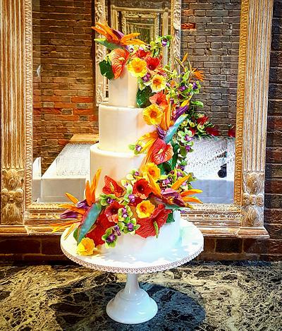 Tropical flower wedding cake with hidden beach scene - Cake by Amelia Rose Cake Studio