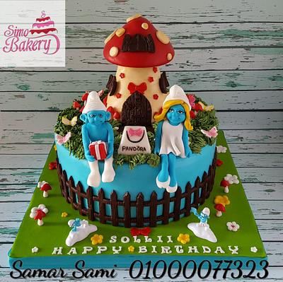 Smurfs cake with smurf and smurfette - Cake by Simo Bakery