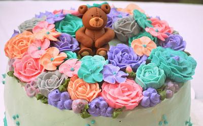 Teddy bear sitting in Rose Garden - Cake by Divya iyer