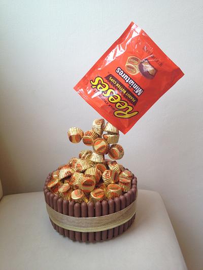 Reece's miniatures gravity cake - Cake by Donna Sanders