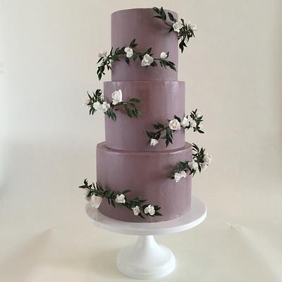 Purple with sugar gardenia and ruscus half halos - Cake by SweetGeorge