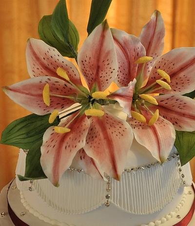 Icing stargazer lilies and extension work wedding cake - Cake by Icing to Slicing