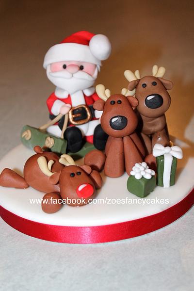 Santa and a few of his reindeer - Cake by Zoe's Fancy Cakes