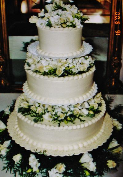 floating on fresh flowers buttercream wedding cake - Cake by Nancys Fancys Cakes & Catering (Nancy Goolsby)