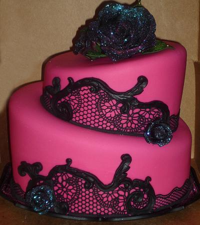 Halloween/Bday cake in hot pink with black surgarveil lace. Roses and stand glow under black light - Cake by Cakery Creation Liz Huber