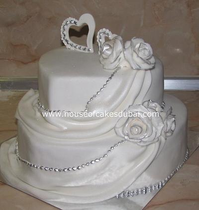 Heart shaped wedding cake - Cake by The House of Cakes Dubai