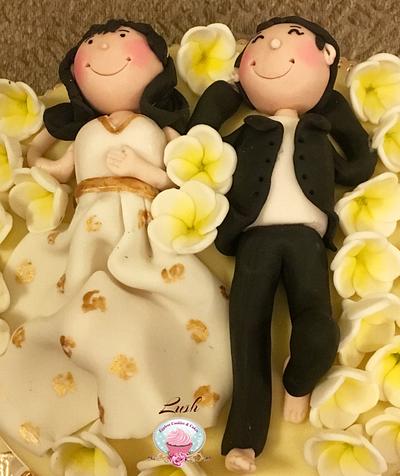 Cute young couple  - Cake by Punam Chhaparwal 