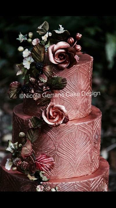 Mixed metals with sugar leaves, berries and blossoms  - Cake by Nicola Gerrans 