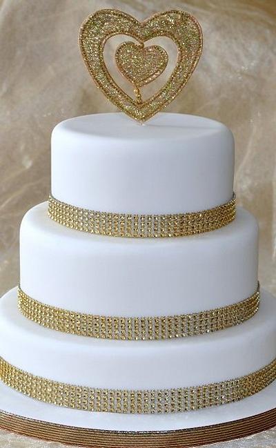 Classy but simple gold and white wedding cake - Cake by Icing to Slicing