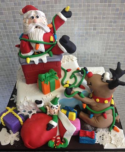 Santa stuck in the chimney - Cake by Over The Top Cakes Designer Bakeshop