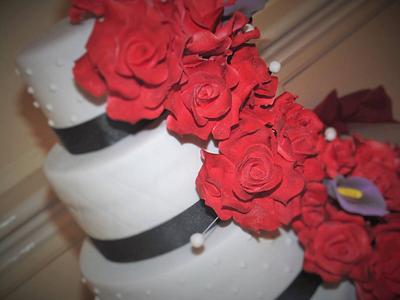 Cascading rose wedding cake - Cake by Clare's Cakes - Leicester