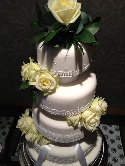 White lace and rose wedding cake - Cake by Nina Stokes
