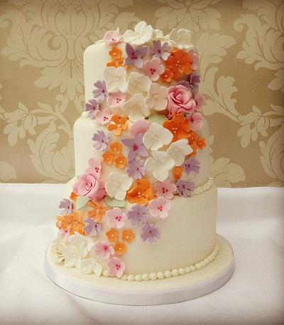 White wedding cake with sugar flower cascade - Cake by funkyfabcakes