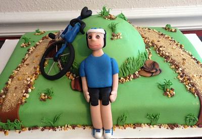 1st fondant figure bike rider  - Cake by Jennifer Duran 