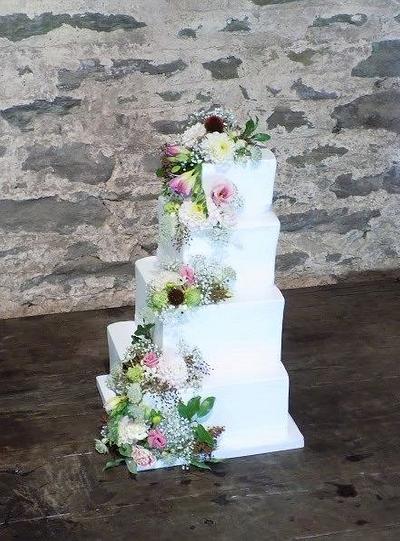 Stepped square wedding cake with Fresh blooms - Cake by Divine Bakes
