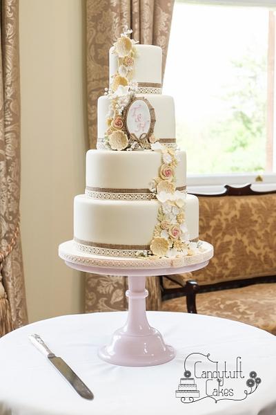 Burlap and lace with flower cascade - Cake by Kathryn