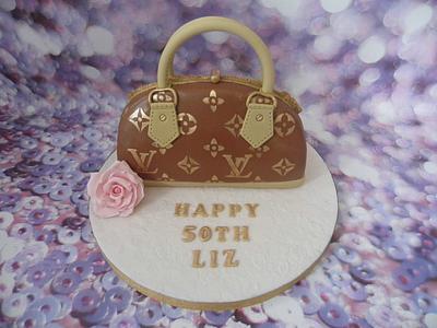 Louis Vuitton handbag cake. - Cake by Karen's Cakes And Bakes.