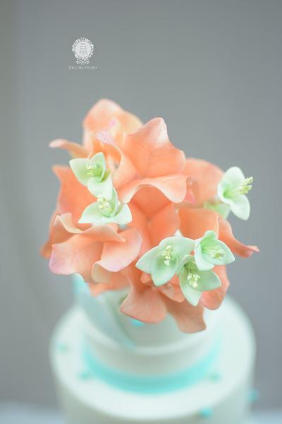 Coral Bougainvillea and Teal Puya on a Cake  - Cake by Sugarpixy