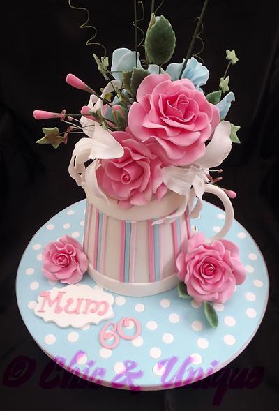 Milk Jug floral display. - Cake by Sharon Young