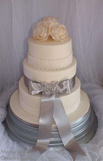 Ivory Wedding simple elegance - Cake by Mother and Me Creative Cakes
