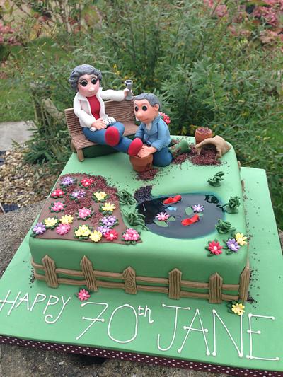 Mrs and Mrs Carter chilling in their garden - Cake by theposhcakeco