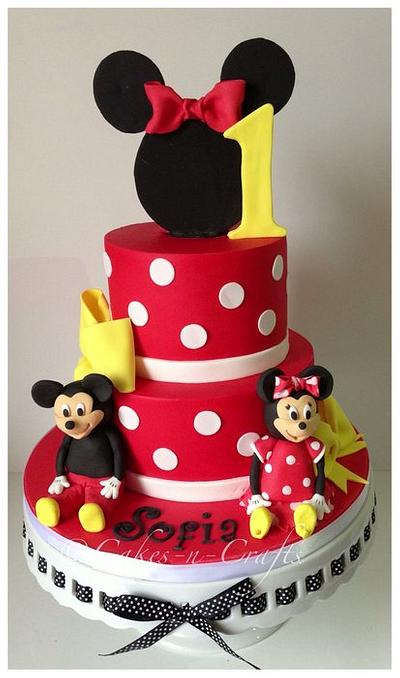 Minnie Mouse with edible Mickey and Minnie figures - Cake by June milne