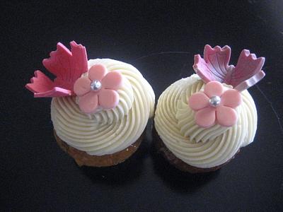 carrot cupcakes with vanilla SBC & marzipan toppers.. - Cake by sonila