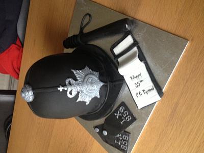 Police helmet  - Cake by Bubba's cakes 