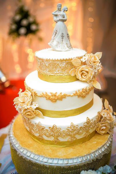 Cream and gold wedding cake - Cake by Bakedpleasures