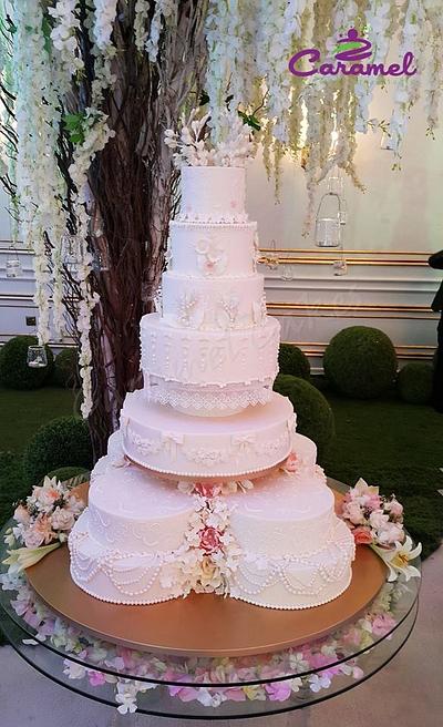Big Romantic wedding Cake - Cake by Caramel Doha