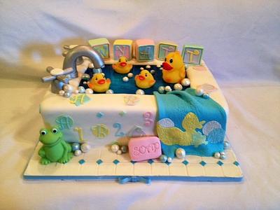 Rub a dub dub look at all the duckies in the tub: Baby Shower cake  - Cake by Caroline Diaz 