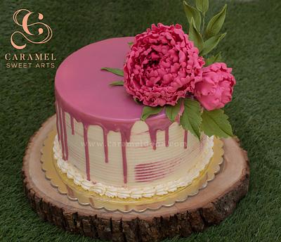 Classic Pink Drip Cake - Cake by Caramel Doha