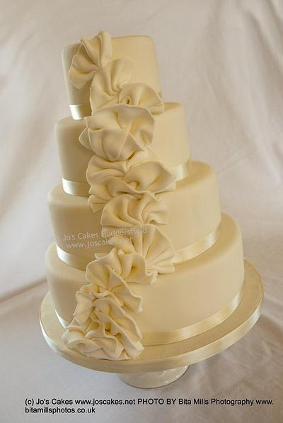 4 tier Ivory Ruffles Wedding Cake - Cake by Jo's Cakes
