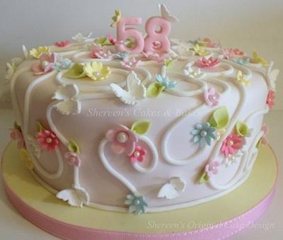 Swirls, flowers and Butterflies - Cake by Shereen