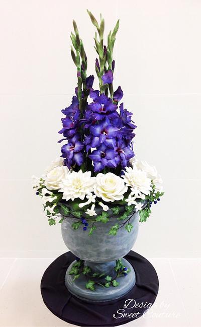 Sugar flowers arrangement  in an urn cake. - Cake by Sweet Couture 