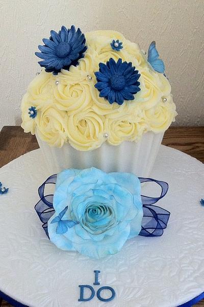 Blue & silver giant cupcake - Cake by CakeMeHappy15