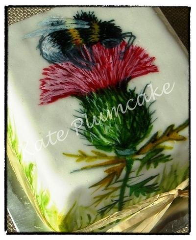 Thistle hand painted on mini cake - Cake by Kate Plumcake