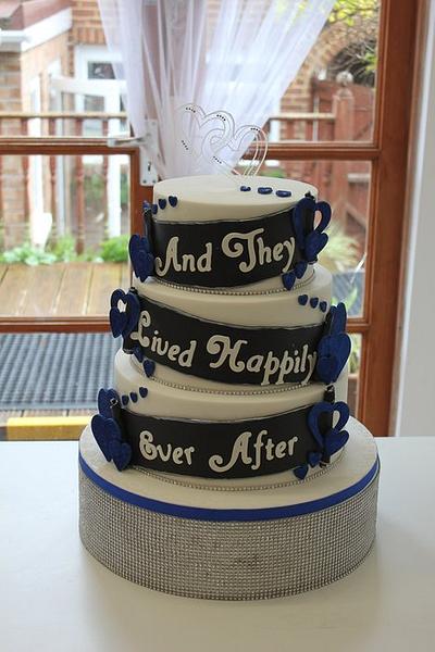 Royal blue, black and white " and they lived happily ever after" wedding cake - Cake by Cakes o'Licious