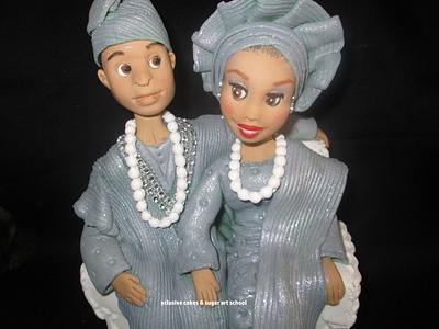 Cake topper - couple in the traditional attire (a touch of silver) - Cake by Xclusive